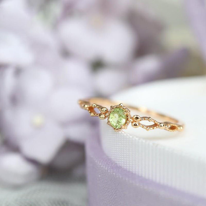 Wholesale Olivine ring hollowed out zircon adjustable ring gold plating niche design