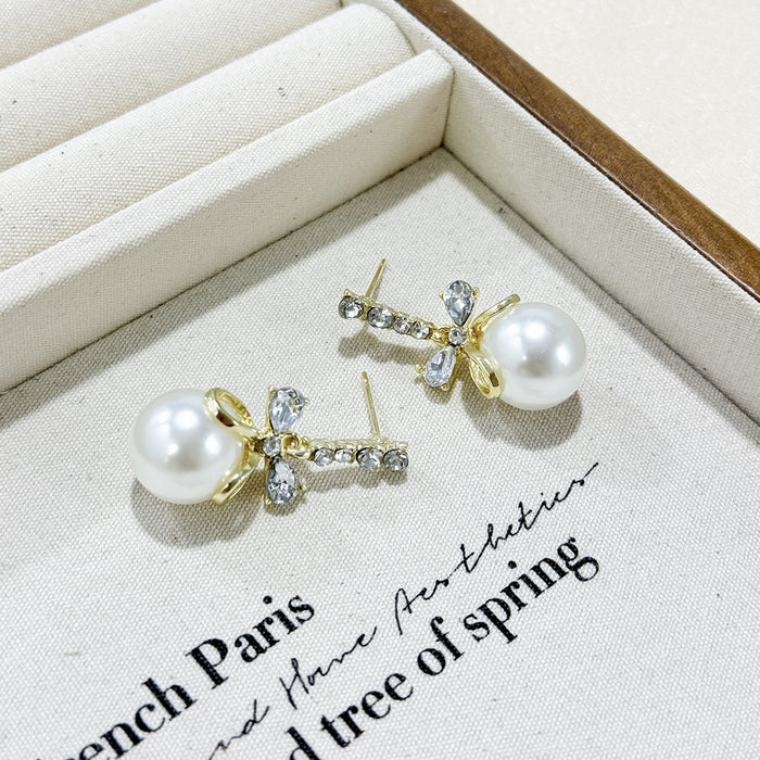 Wholesale Butterfly knot pearl pendant earrings, niche fashion, versatile design, knotted earrings