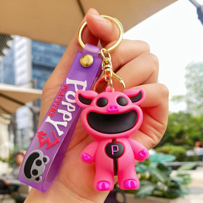 Wholesale Cute silicone smiling animal keychain