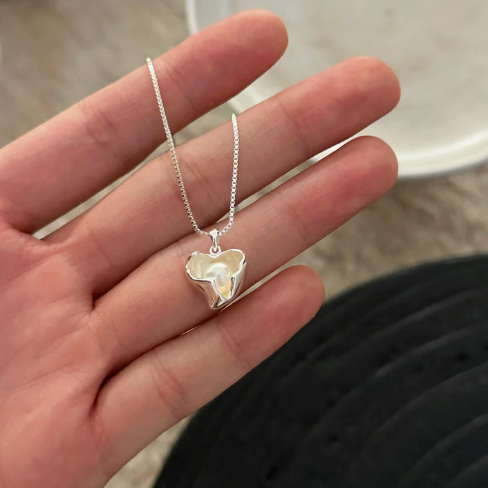 Wholesale Irregular love pearl necklace, light luxury, niche sweater chain, high-end feel