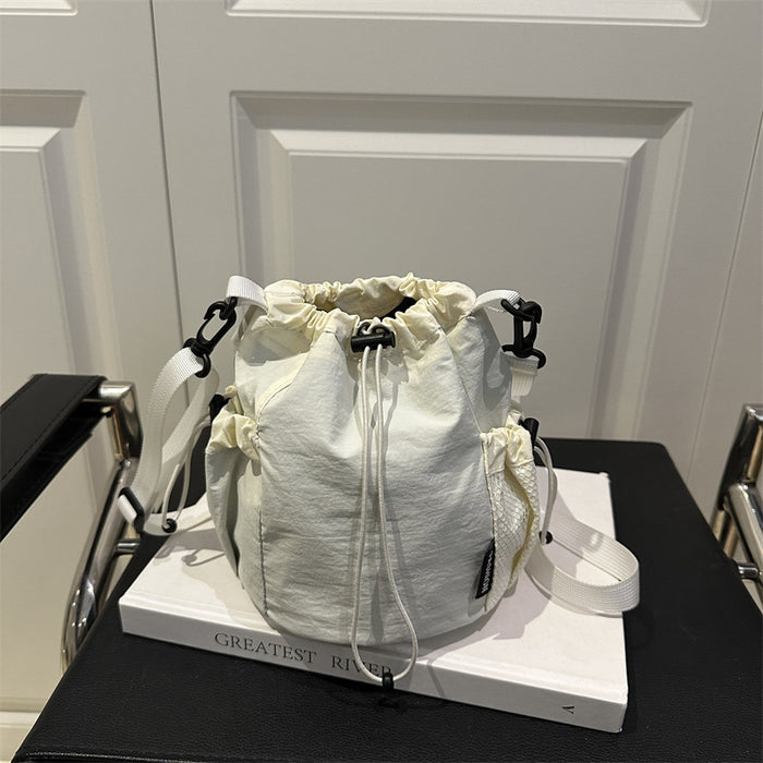 Wholesale Small niche design drawstring bucket bag, outdoor sports, leisure, fashion, versatile nylon crossbody bag