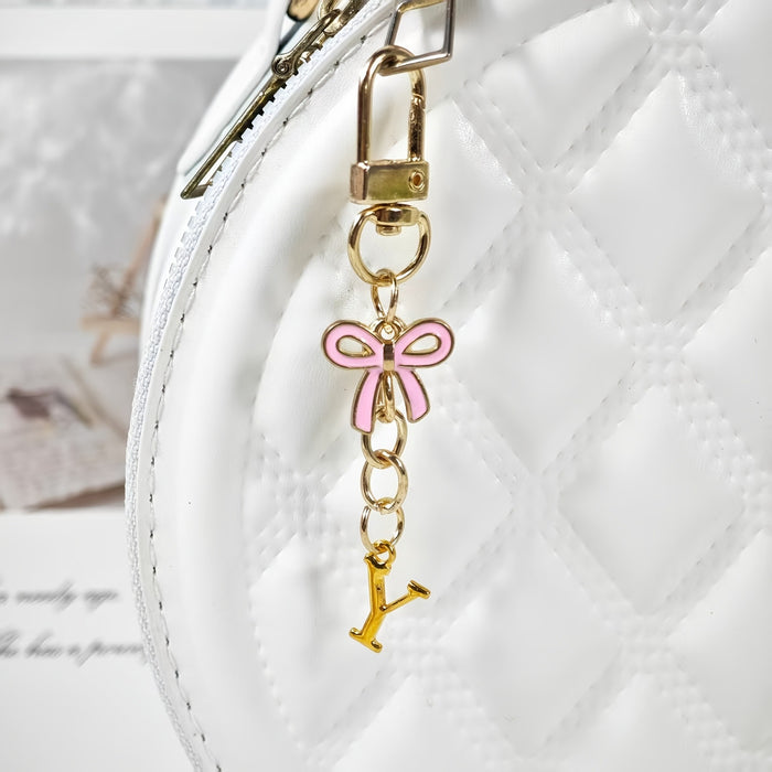 Wholesale Pink bow A-Z keychain alloy accessory