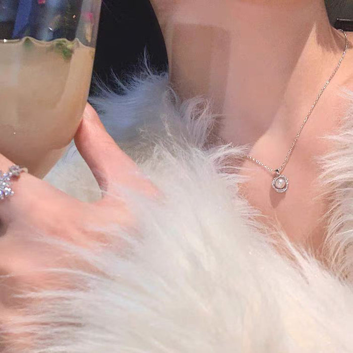 Wholesale Titanium steel necklace with full diamond pearl pendant, elegant and luxurious, versatile collarbone chain accessory