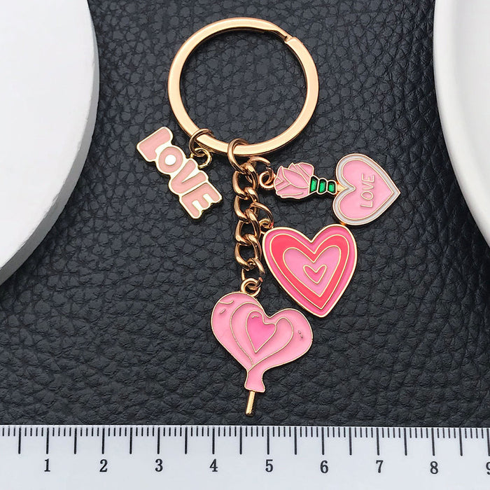 Wholesale Cute pink heart-shaped rose potion metal  keychain