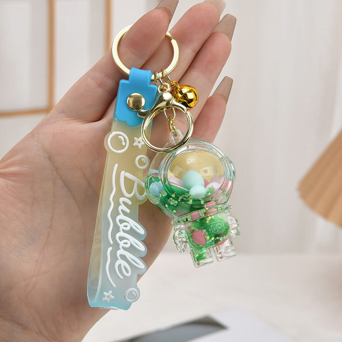 Wholesale Acrylic oil bottle candy Bean astronaut keychain