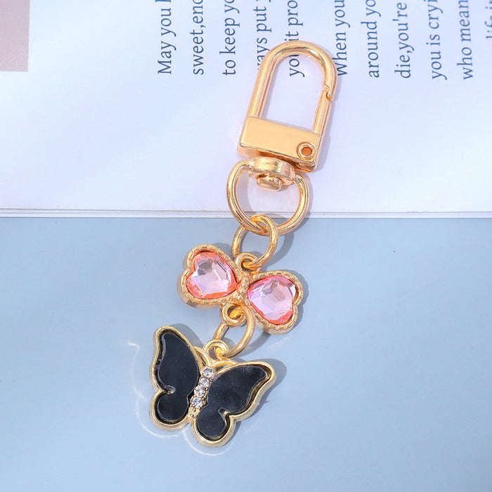 Wholesale Keychain Pendant Creative Alloy Butterfly Headphone Mobile Phone Bag Pendant