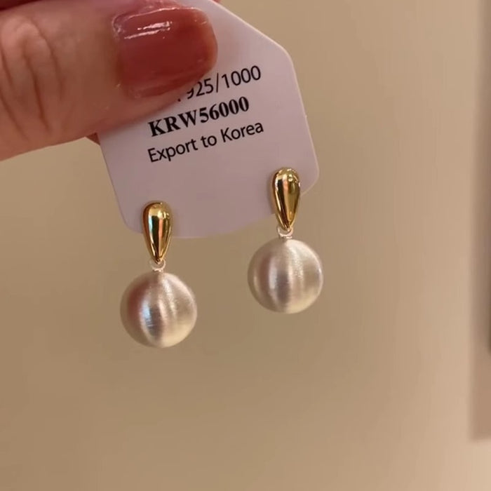 Wholesale The niche frosted brushed metal ball earrings have a simple and high-end temperament