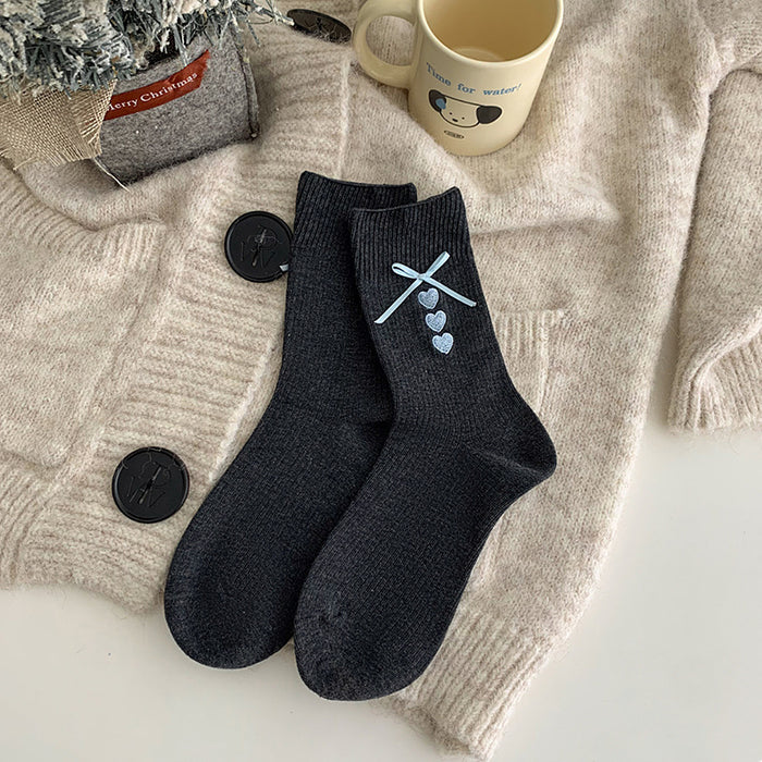 Wholesale Embroidered heart-shaped tube socks with blue ribbon and bow, stacked socks