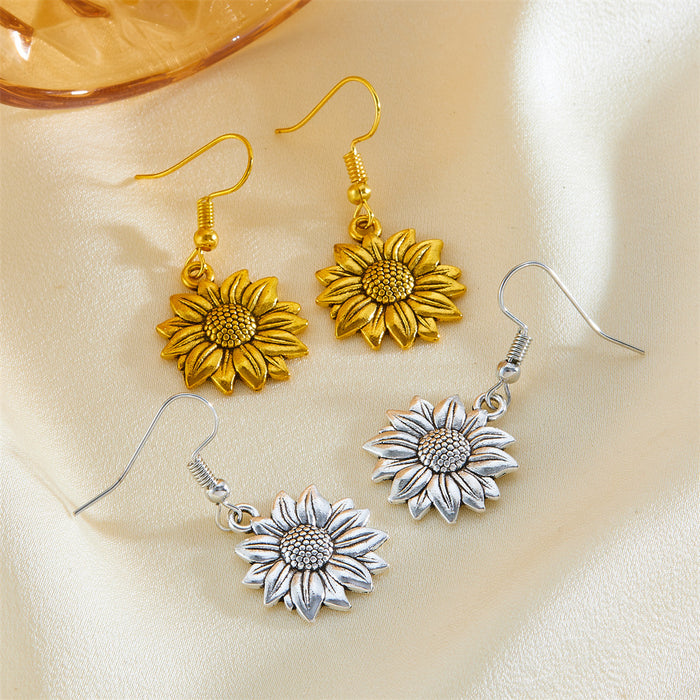 Wholesale Exaggerated gold sunflower titanium steel gold-plated earrings