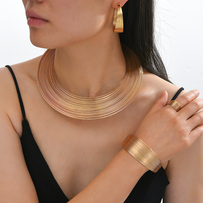 Wholesale Exaggerated metal ring-shaped multi-layered circular jewelry set.