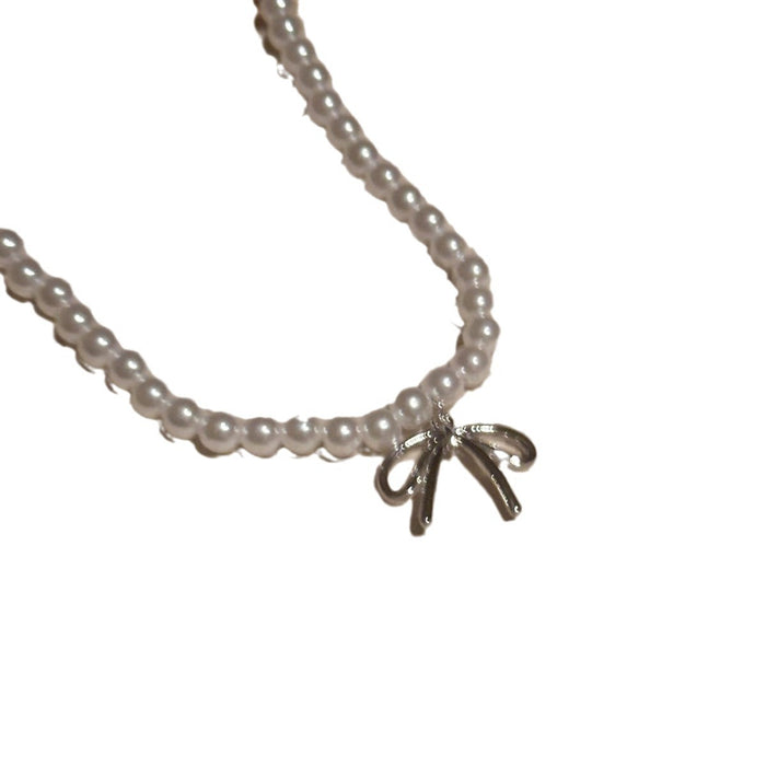 Wholesale Pearl bow pendant necklace, light luxury collarbone chain, niche high-end sense, temperament necklace