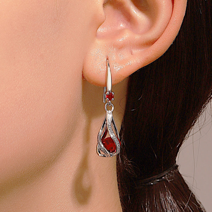 Wholesale Zircon Water Drop Earrings with Female Personality and Charm, Hollow Rotating Crystal Earrings