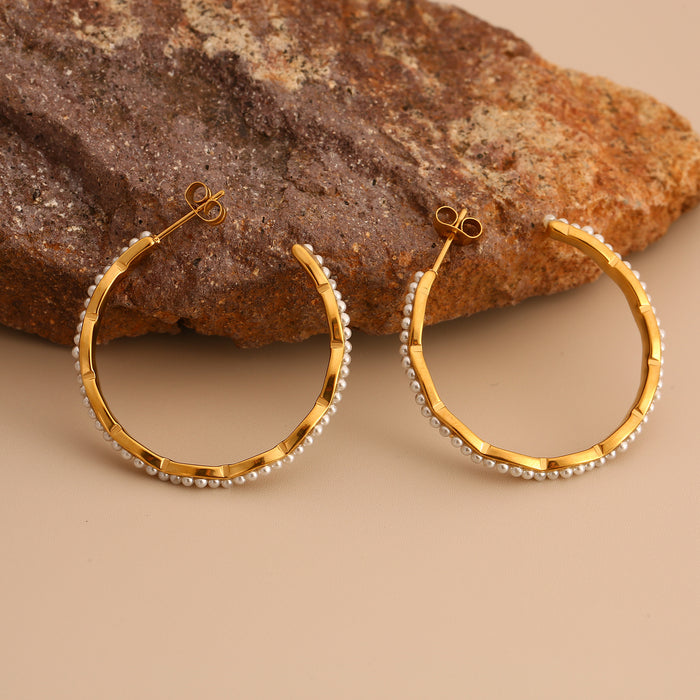 Wholesale Original design: Stainless steel earrings inlaid with pearls, personalized, luxurious, and high-end. Earrings with color preservation and electroplating wholesale
