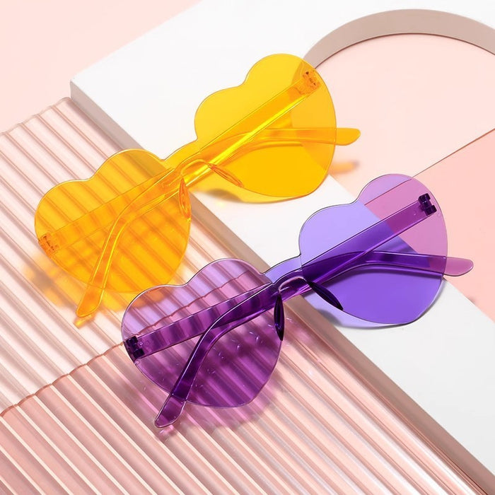 Wholesale Love sunglasses party one-piece frameless sunglasses transparent peach heart glasses