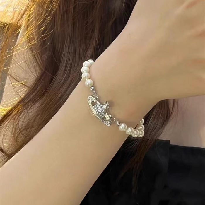 Wholesale Saturn Hollow Full Diamond Pin Pearl Bracelet JDC-BT-YiHao002