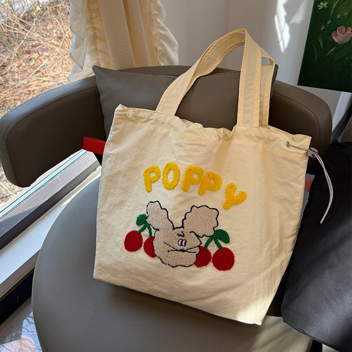 Wholesale New cartoon embroidery drawstring shoulder bag, casual canvas bag, large capacity commuting bag
