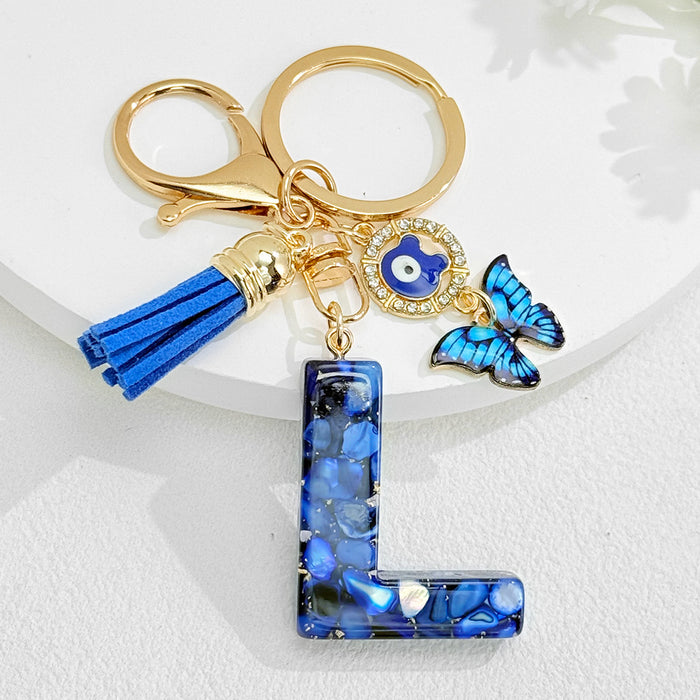 Wholesale Royal Blue 26 Letter Keychain with Evil Eye Butterfly Tassel Pendant