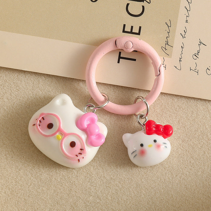 Wholesale Cartoon Cat With Bow And Glasses Resin Keychain Pendant Chic Decorative Accessory