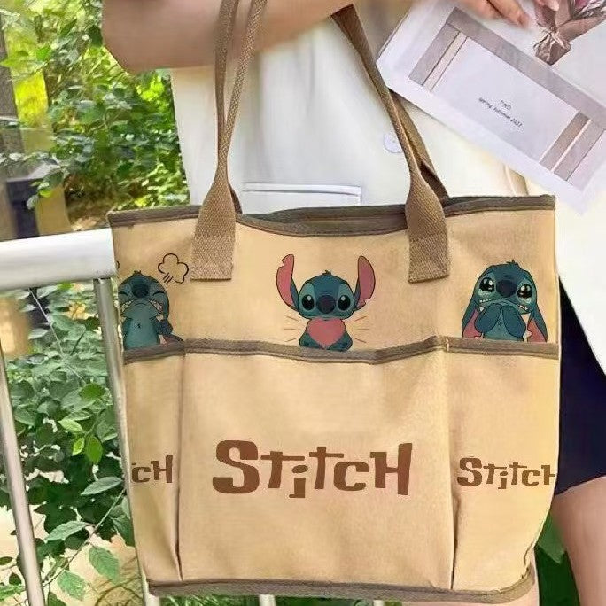 Wholesale Cartoon canvas bag for women's casual and versatile, hand-held for outdoor use, large capacity practical shoulder bag