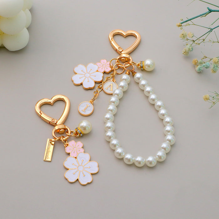 Wholesale Flower Pearl Pendant Keychain Girl Beaded Mobile Phone Chain Headset Bag Pendant