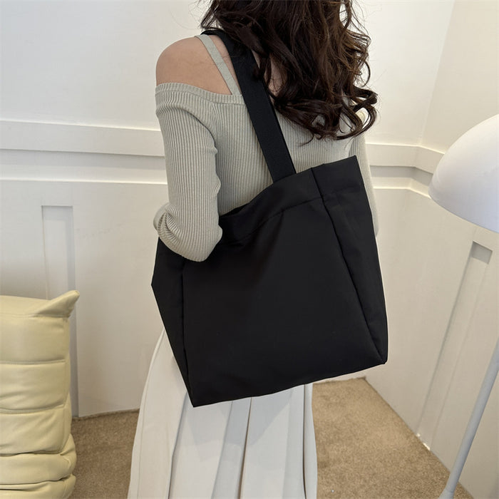 Wholesale Solid color large capacity canvas shoulder bag, simple commuting tote bag, shopping bag