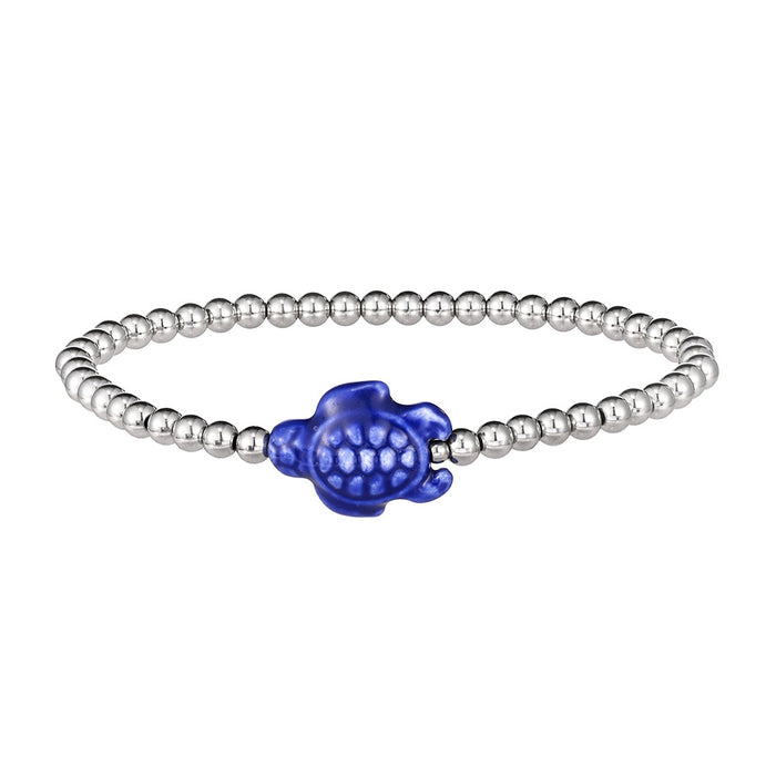 Wholesale Swimming wearable mini bracelet accessory ceramic conch animal turtle titanium steel non fading bracelet