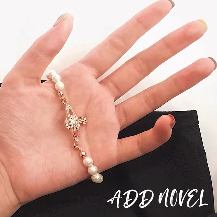 Wholesale Rhinestone Saturn Pearl Bracelet JDC-BT-TianYin004