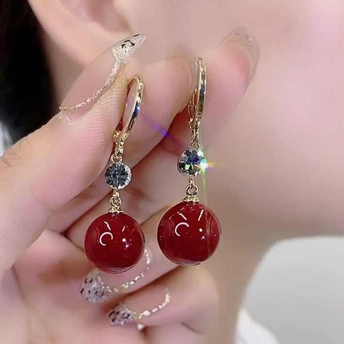 Wholesale Acacia earrings red pearl earrings with sweet temperament