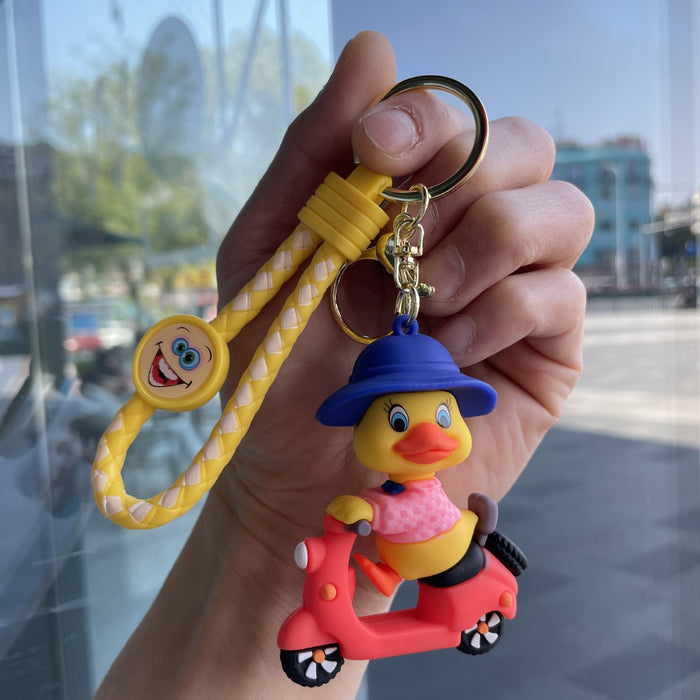 Wholesale Tram couple duck keychain couple backpack pendant claw machine doll car keychain exquisite small gift wholesale