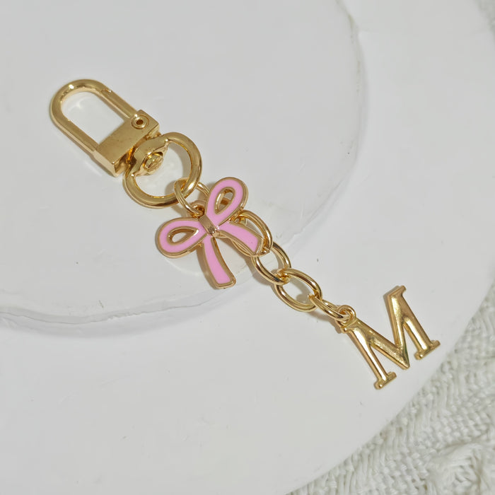 Wholesale Pink bow A-Z keychain alloy accessory