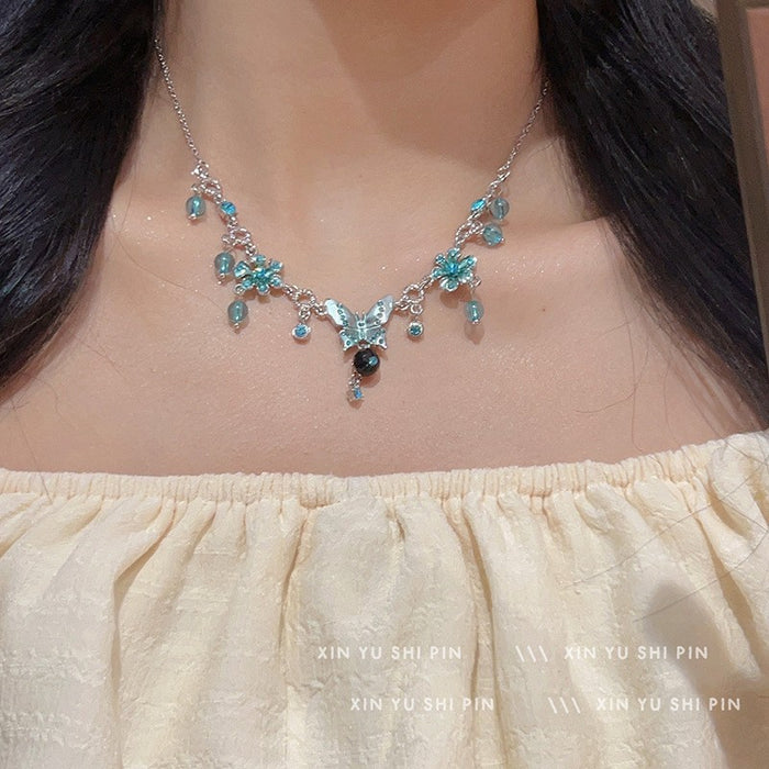 Wholesale Light luxury sparkling diamond water droplet fringe necklace, niche design, high-end temperament, versatile butterfly pendant, collarbone chain