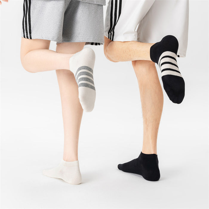 Wholesale Couple sports socks with asymmetrical stripes on the four bars