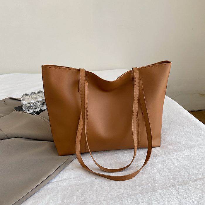 Wholesale Textured underarm bag women' s new simple versatile shoulder bag fashionable large capacity student commuter tote bag