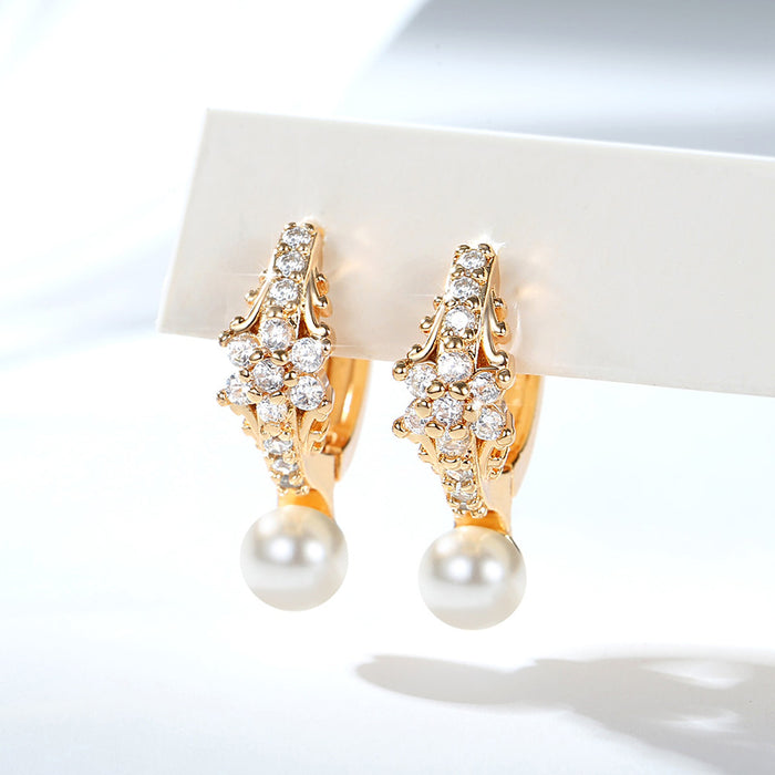 Wholesale Copper gold-plated retro light luxury simple pearl earrings, small and fashionable design, inlaid with zircon ear buckles, wholesale of ear accessories