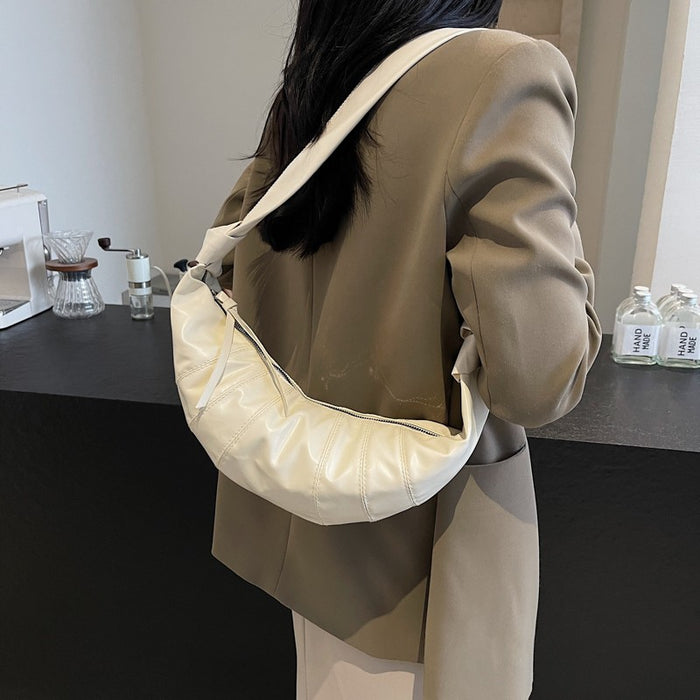 Wholesale Folded design crescent crossbody bag with large capacity soft leather retro temperament, layered shoulder bag