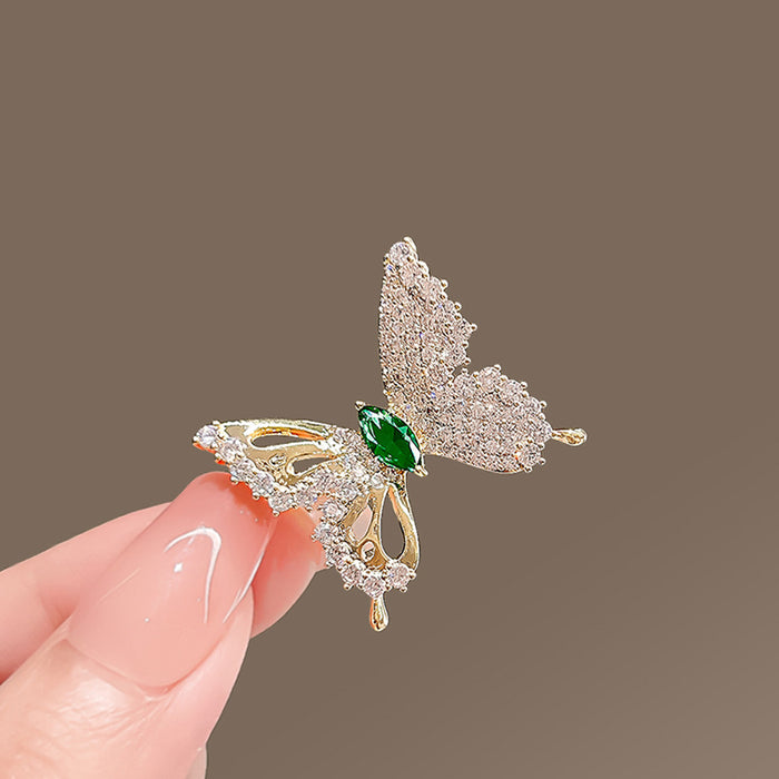 Wholesale Light luxury, dynamic butterfly hollow sparkling diamond brooch, anti glare buckle, temperament cardigan, silk scarf buckle, fixed clothes