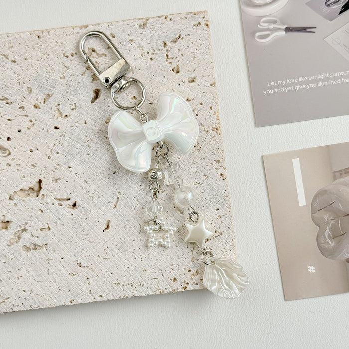 Wholesale Bow shaped mobile phone chain handmade bead bag trailer keychain camera card bag pendant