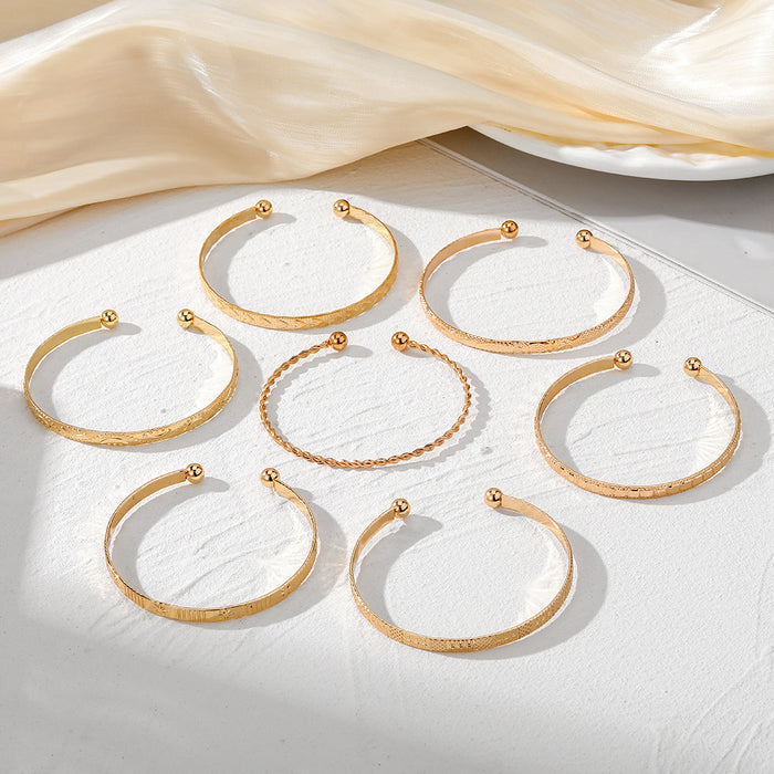 Wholesale 7-piece set of arrow-shaped diamond pattern hexagonal twisted open bracelet