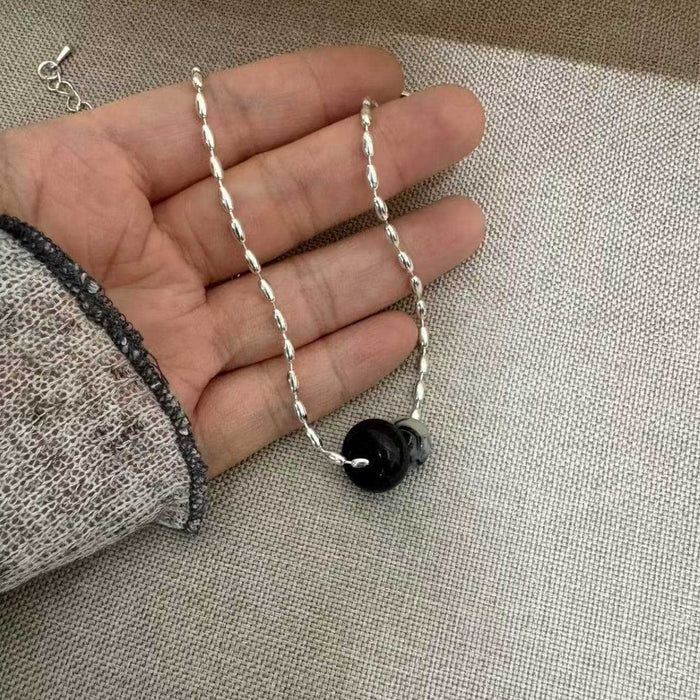 Wholesale Simple natural stone donut water droplet tiger eye pendant necklace, niche high-end sweater chain