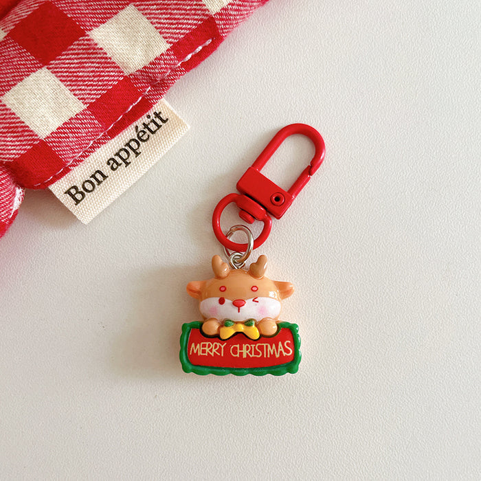 Wholesale Trendy Cartoon Christmas Resin Keychain Pendant  Design Bag Charm Gift Accessory For Resale
