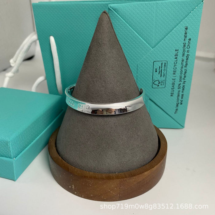 Wholesale Classic open mouth couple bracelet, fashionable concave steel seal letter wide version bracelet