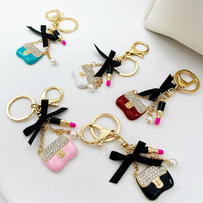 Wholesale Rhinestone Lipstick Bow Zinc Alloy Keychain JDC-KC-ZhanLun008