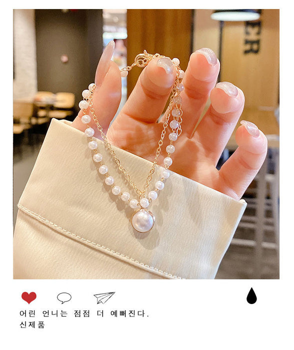 Wholesale Niche double-layer pearl pendant necklace with simple temperament, neckchain, collarbone chain