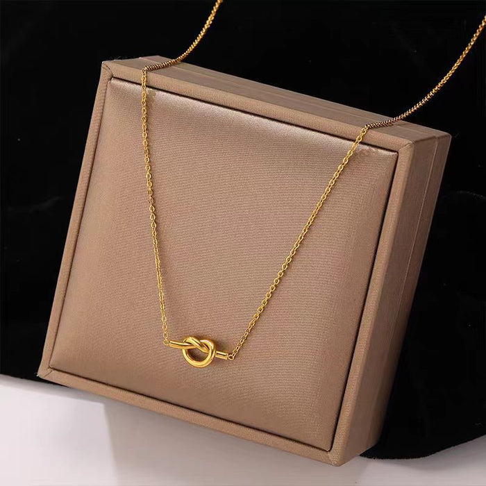 Wholesale Stainless Steel Clavicle Chain Necklace — Asymmetrical Design featuring a Bowknot  Rhinestone Accents  and Heart Pendant