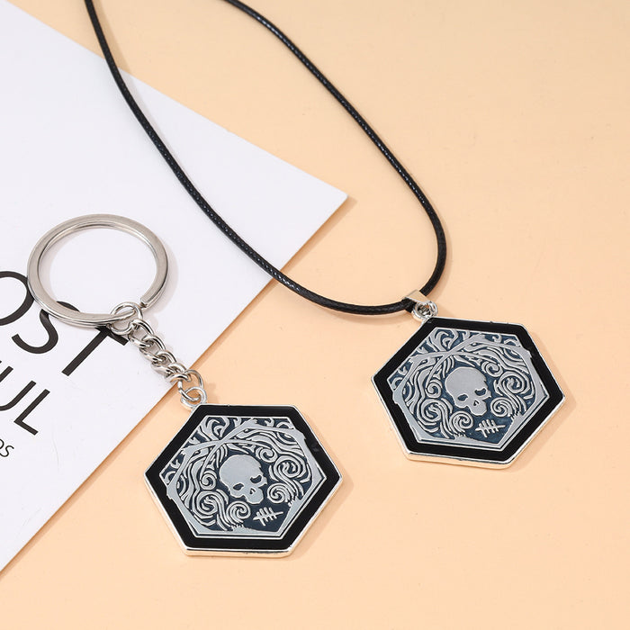 Wholesale Zinc alloy double sided skull keychain necklace