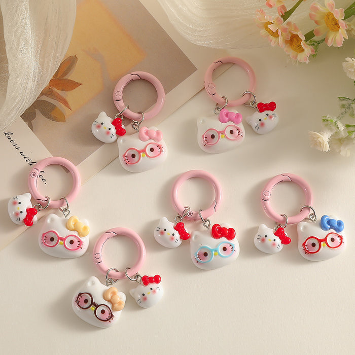 Wholesale Cartoon Cat With Bow And Glasses Resin Keychain Pendant Chic Decorative Accessory