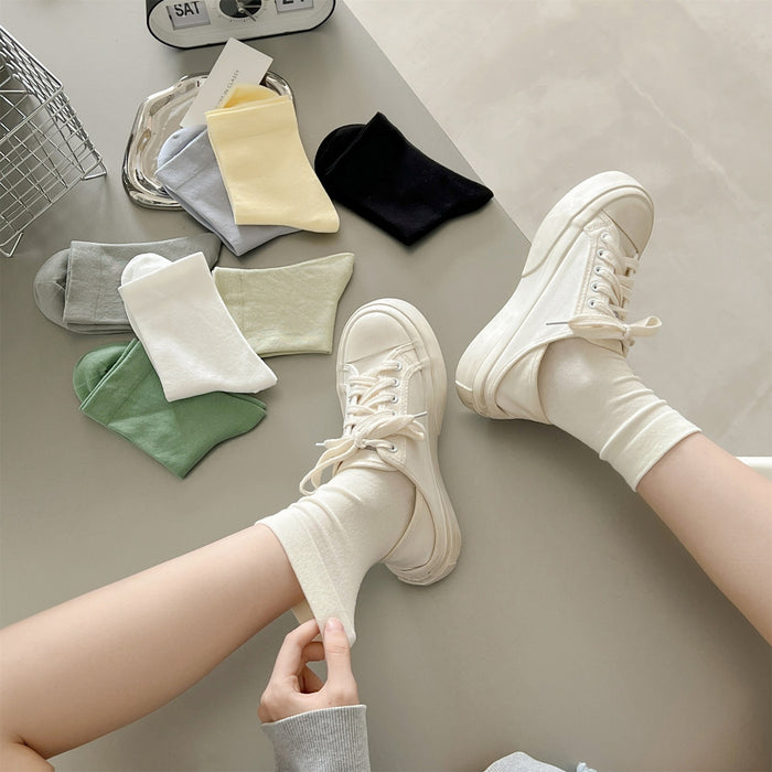 Wholesale Middle school women's solid color simple pile socks made of pure cotton