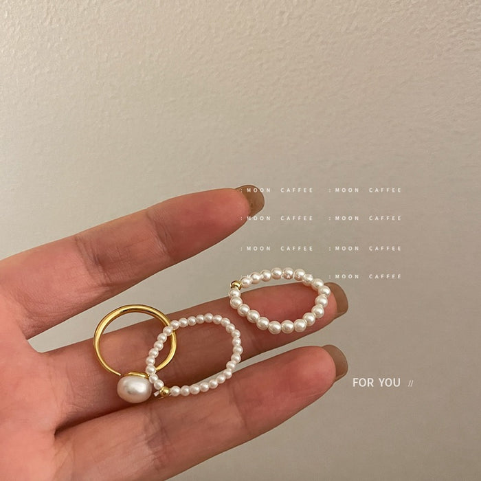 Wholesale Light luxury mini pearl bead elastic rope ring with a retro temperament that does not touch the wrist circumference, freshwater pearl ring