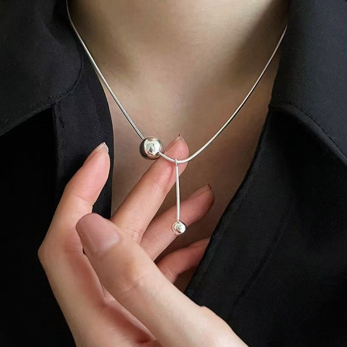 Wholesale New stainless steel titanium steel metal ball pendant necklace that does not fade, sweater chain with high-end feel, collarbone chain