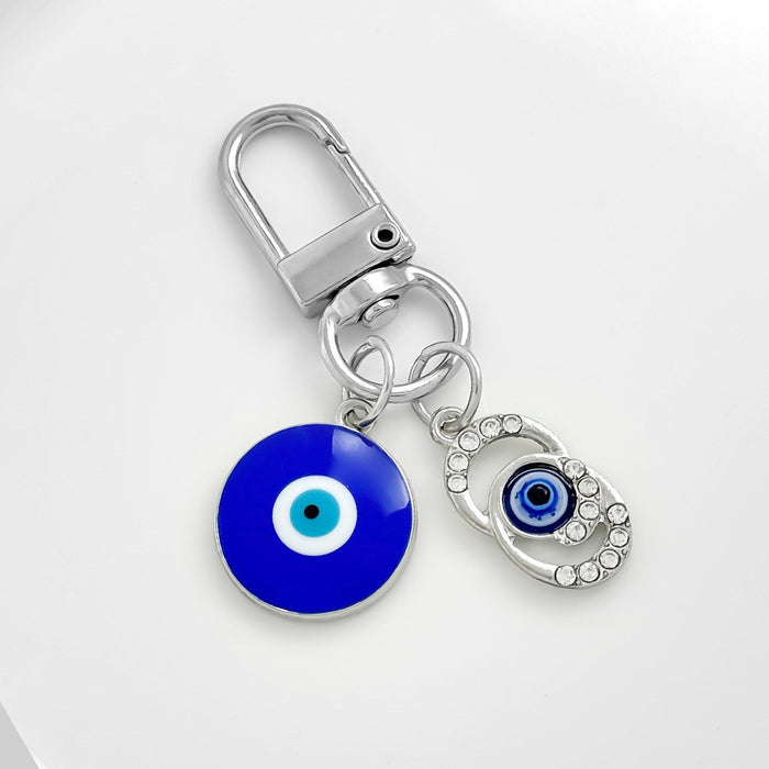 Wholesale Diamond-encrusted blue eyes evil eye tassel keychain